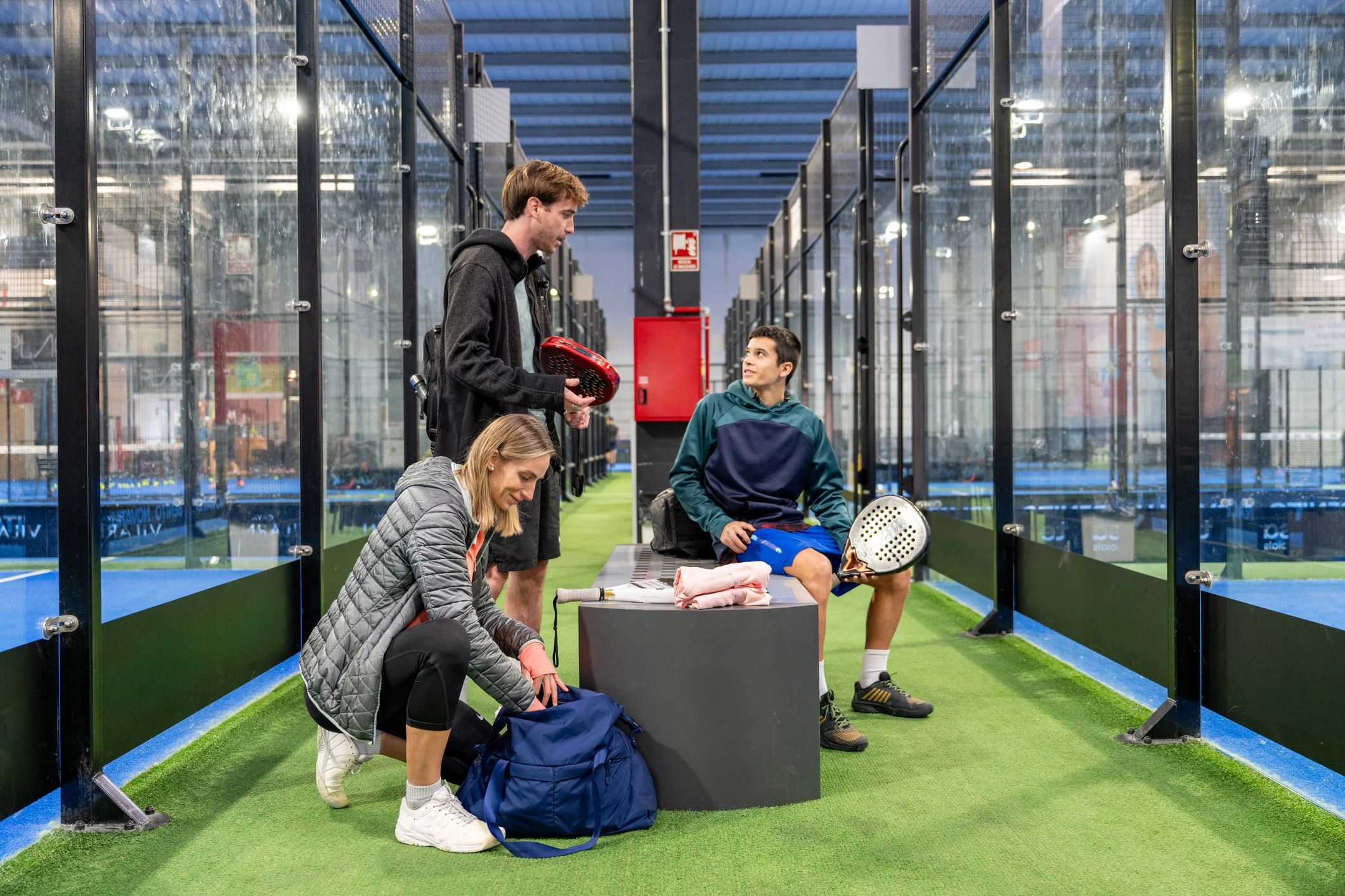 Members arriving at an indoor pickleball club